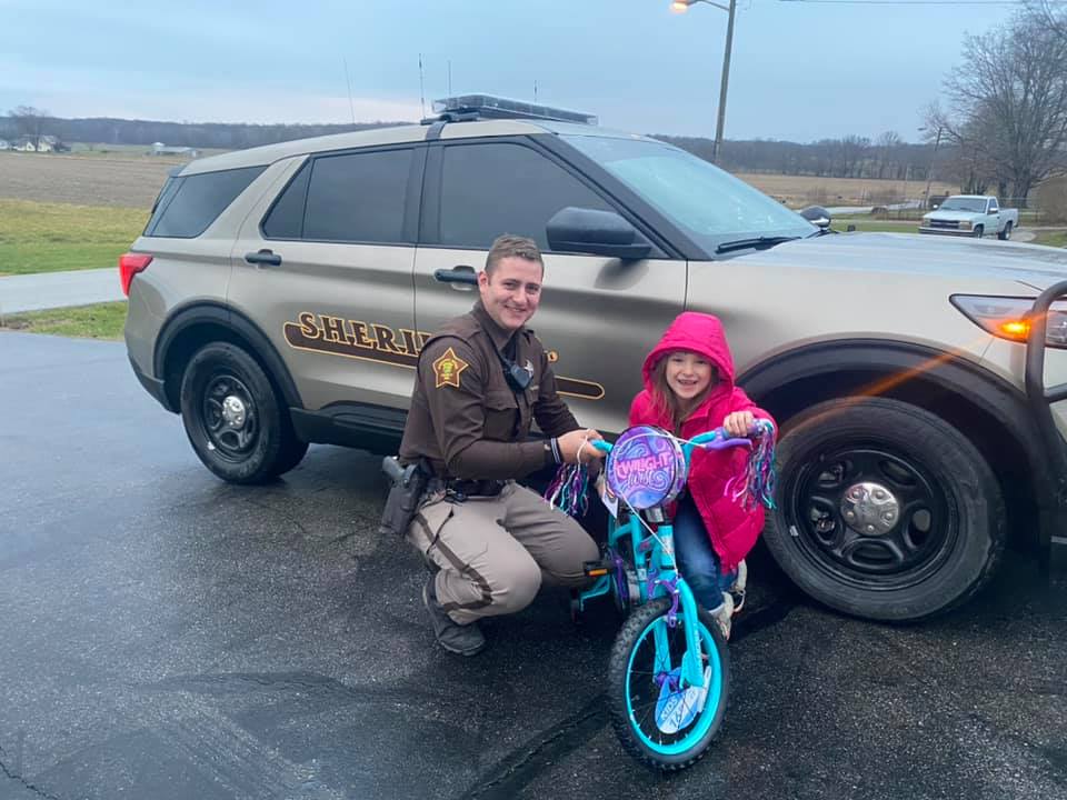 Deputy Pool Presenting A Bicycle